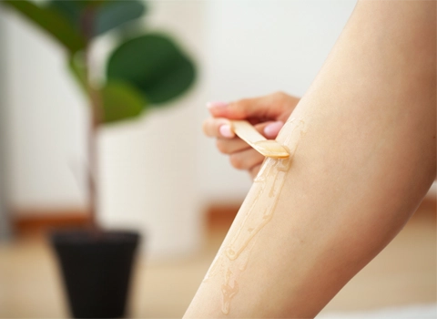 Waxing vs. Sugaring: Choosing the Right Hair Removal Method for Your Clients